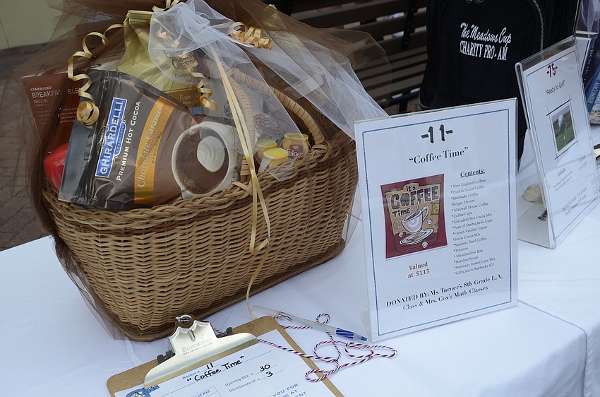 Themed gift baskets, such as this coffee basket, were bid on in the silent auction.