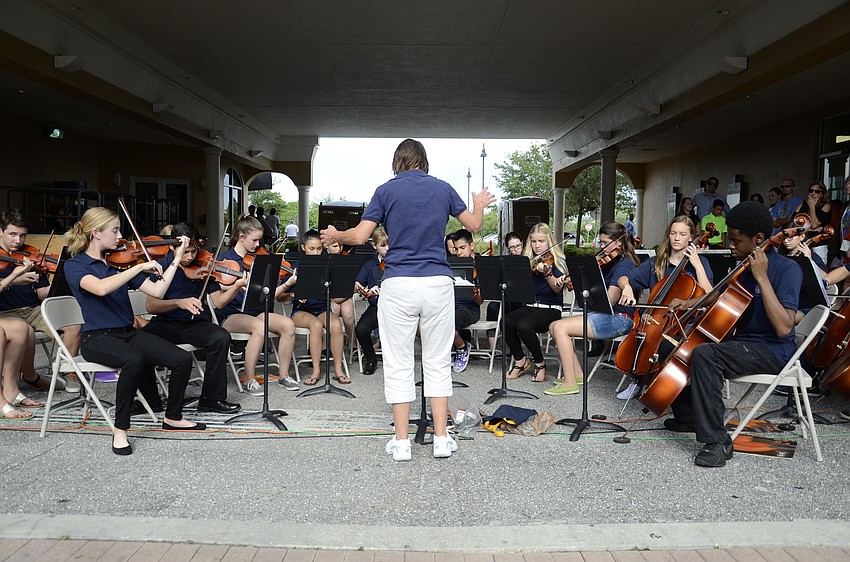 Director Helene Franco directs the chamber choir.