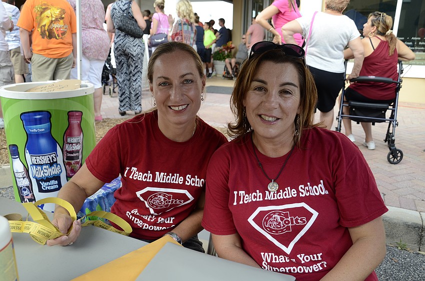 Jennifer McManis and Maria Freer ran a ticket booth for a shift.