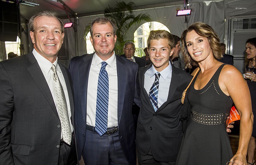 Jimbo Fisher with Derek, Dalton and Heather Bryd