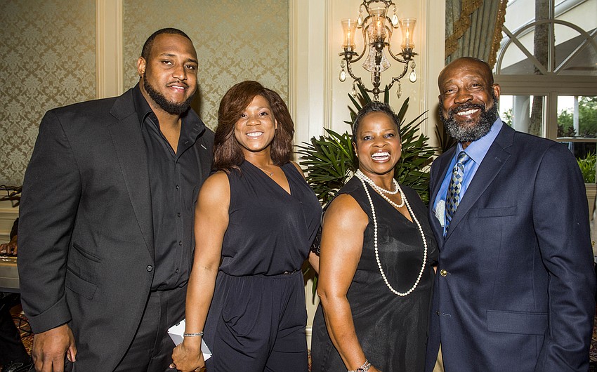 Rob and Natalie Sims with Johnnie and Tony Nathan