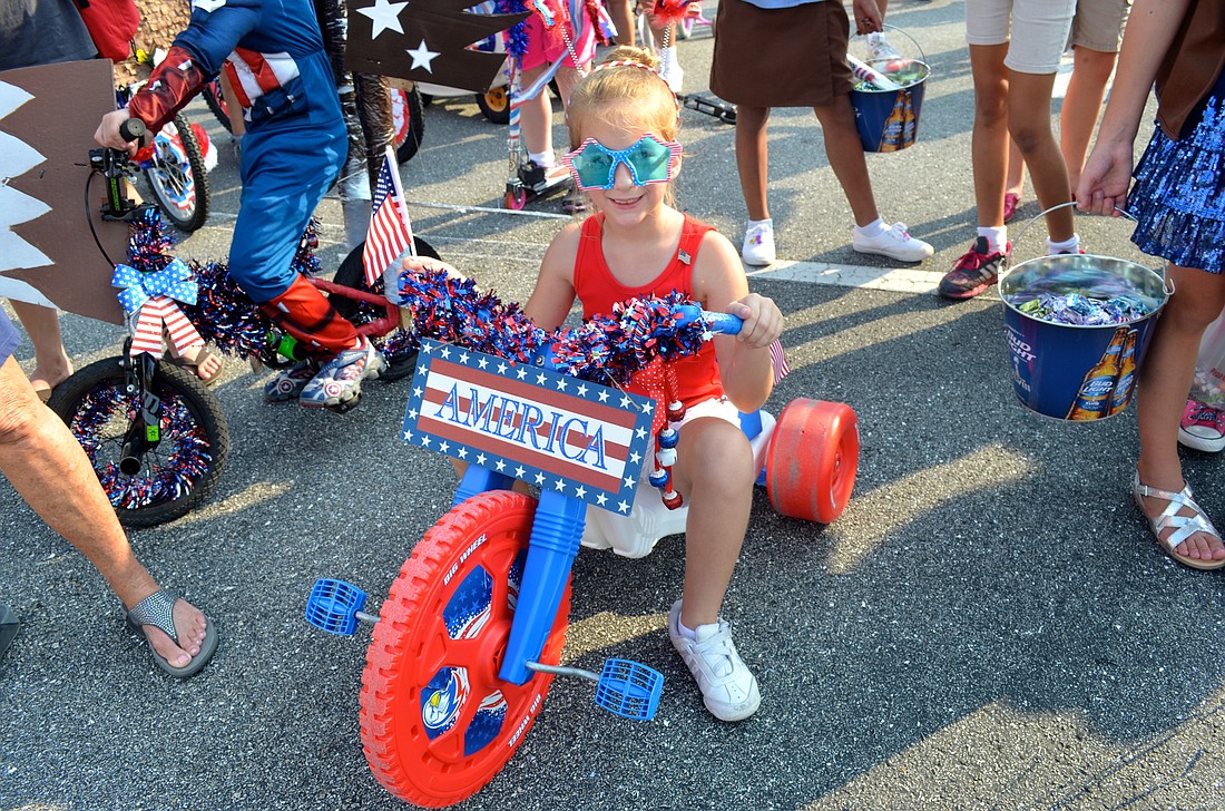 Aubrey Grimwood cruises through the 2014 parade.