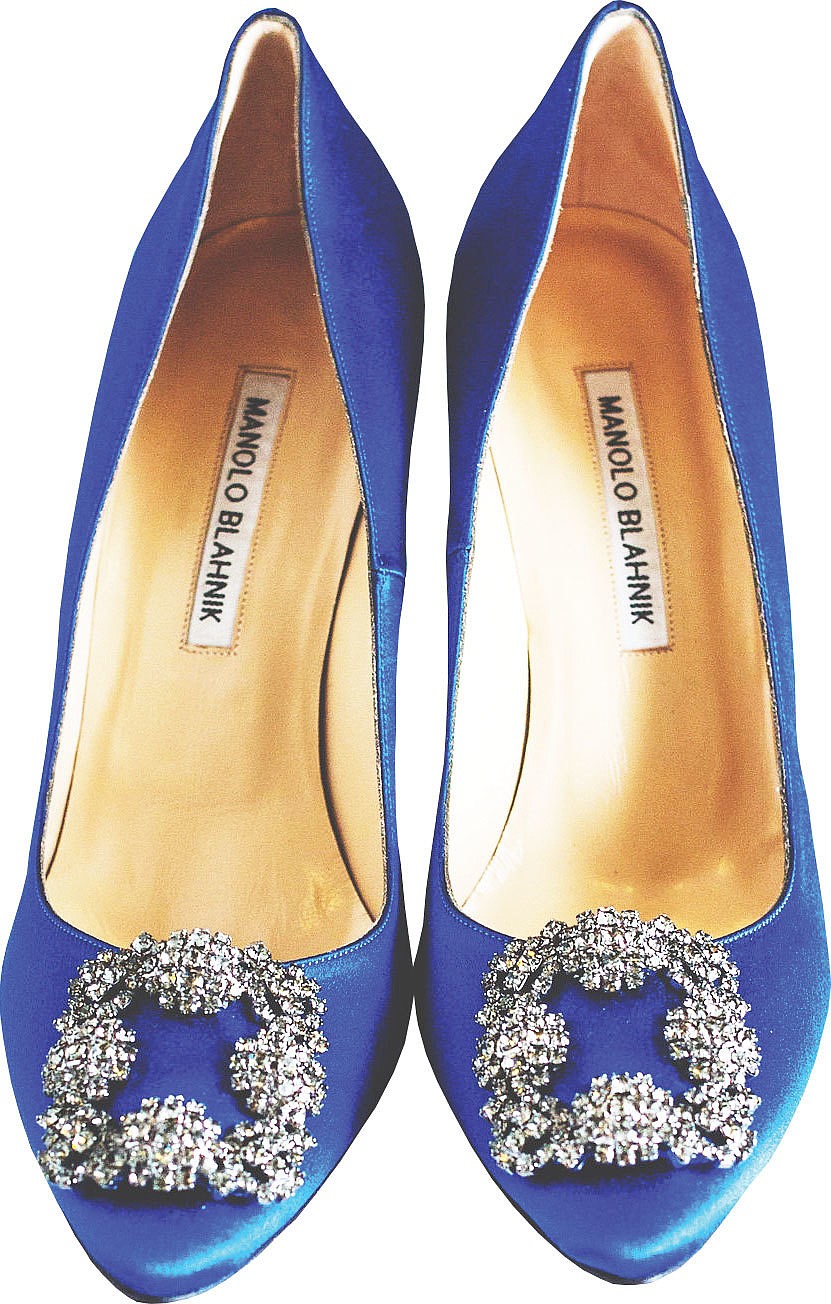 The bride wore her dream wedding shoes, the blue Manolo Blahniks from “Sex and the City.” It took her six months to get a hold of a pair.