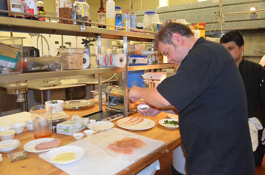 Executive Chef Andrea Bozzolo creates the second course.