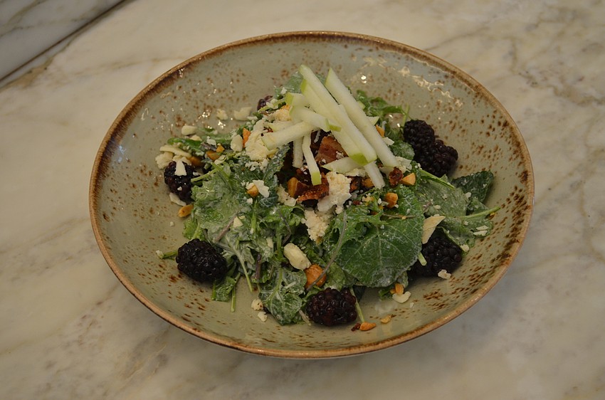 Kale & White Cheddar Salad (Winter Park aged cheddar, local baby kale, bacon, apple, blackberry and almond)