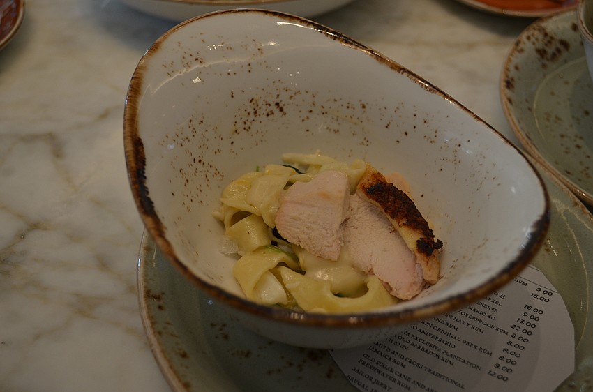 Organic Chicken Breast (tagliatelle pasta, local rocket, “Faithful Farms” tarragon cream, tomato and lump crab)
