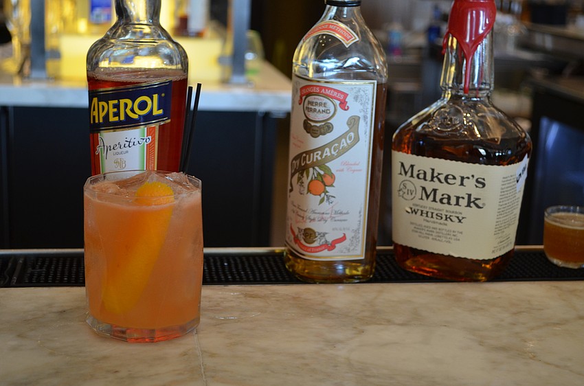 The Princeton (Maker’s Mark, orange curacao, aprol, lemon, grapefruit and ginger beer)