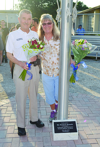 Dan and Tootie Kennedy receive a plaque to commemorate their contributions to the Sarasota Military Academy. Photos by Amanda Morales