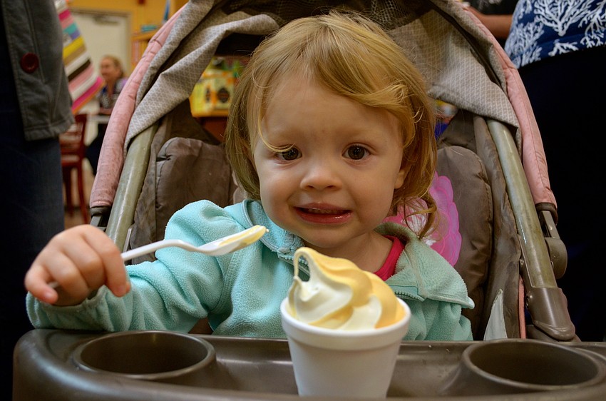 Ariana Dickherber isn’t too cold for orange ice cream.