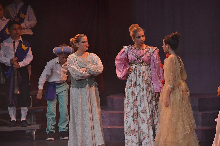 Center: Ansley Morris plays Cinderella's stepmother with stepsisters played by Toby Conyers and Sofia Santiago