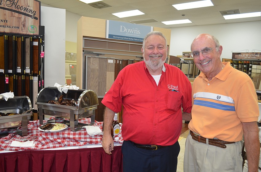 Jack Dean and Walter Bertrand, of host G. Fried FlooringAmerica