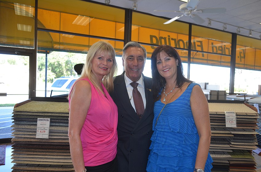 Ramona Glanz, of National Awards, Andrew Vac, of RE/MAX and Tammy Halsted of RVA Resort Vacations