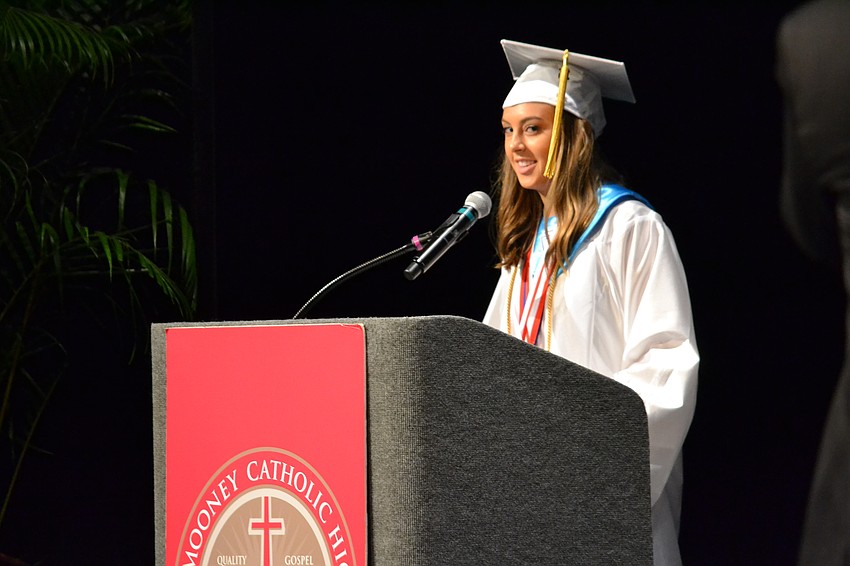 Valedictorian Alexandra Firek addresses her classmates one last time with words of encouragement.