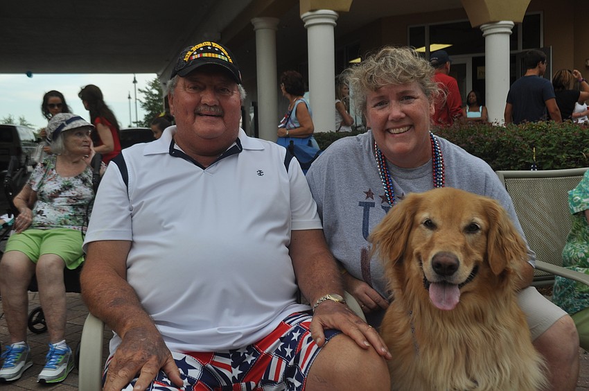 Joe Flynn, Kelly Suba and Toby the Golden Retriever