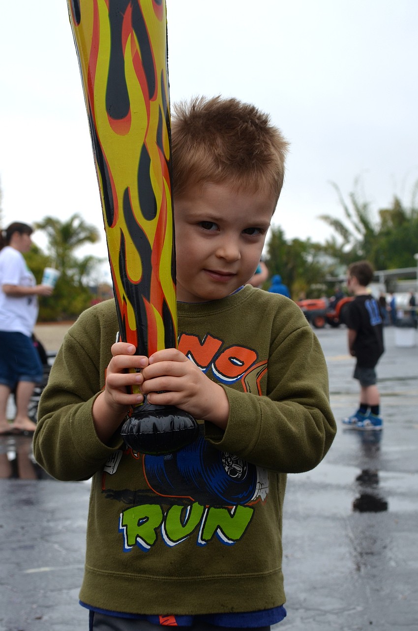 Bryson Vazquez shows off his blown up baseball bat.