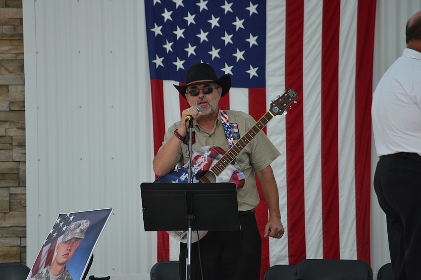Craig Gross performs his original song “They Buried My Son in Arlington” in memory of his son Cpl. Frank Gross.