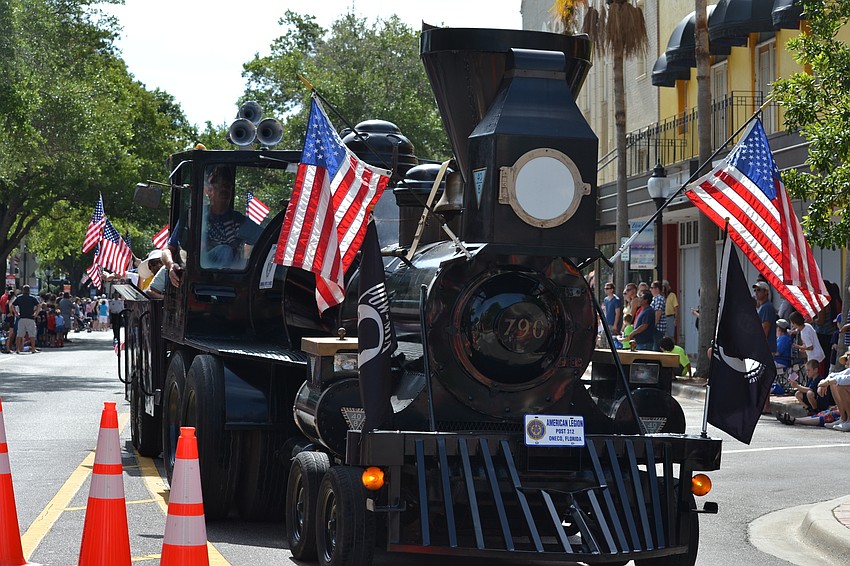 The American Legion Post 312 rode through the route on a train car.