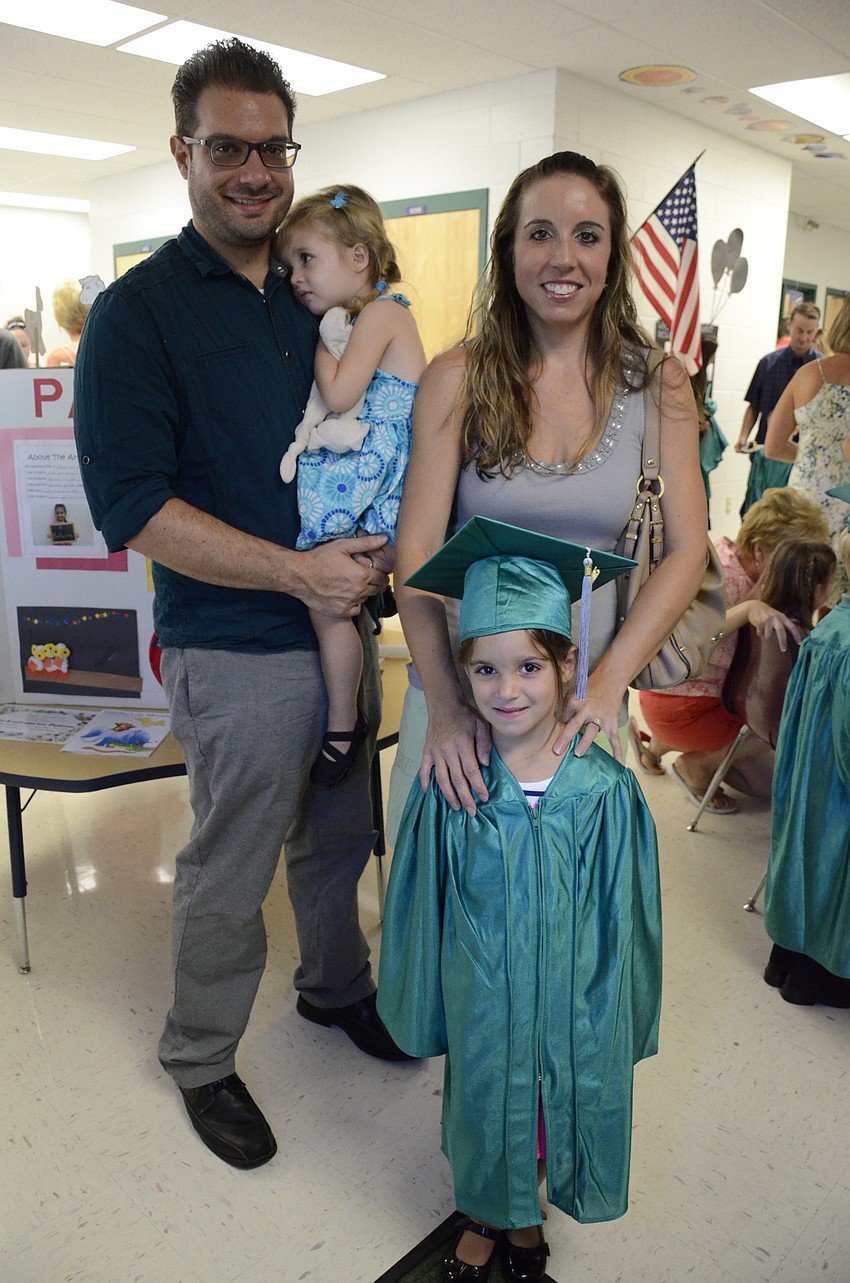 Greg and Melissa Broderick with their daughters Ally and Paige, the graduate.