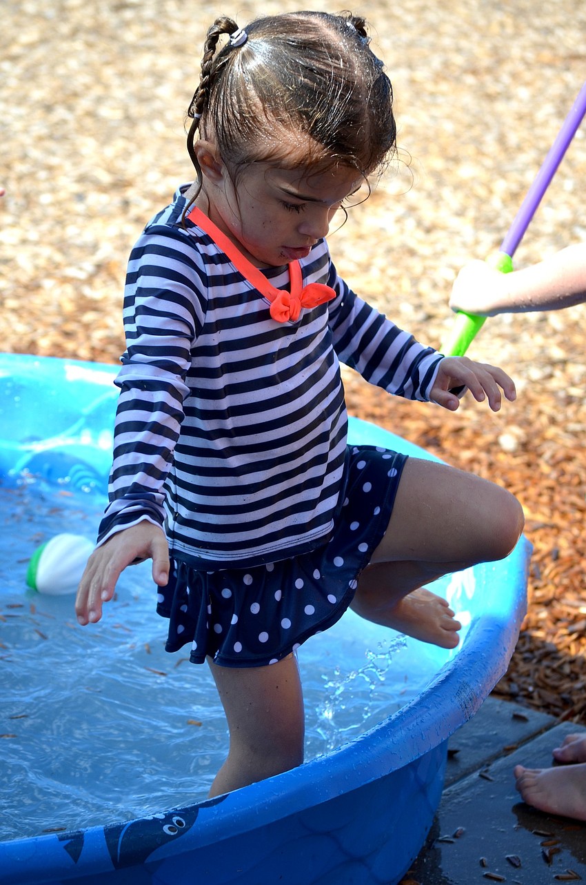 Olivia Flint enjoys a dip in the pool.