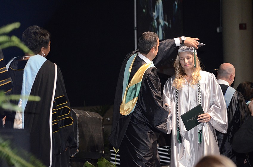 Maya Kwasniewski waits for her tassel to be turned.