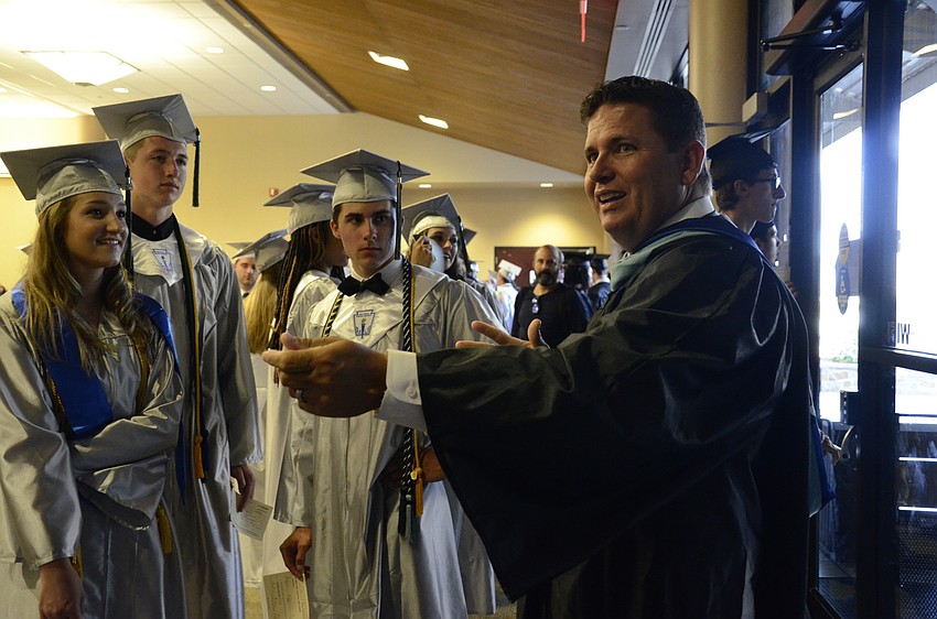 Assistant Principal Mike Mullen tells the students a story.