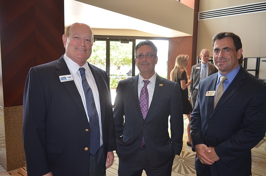 Ray Reher, president of Innovative CFO Solutions, Marc Simms, of RPM, and David Fink, of Rogan & Associates