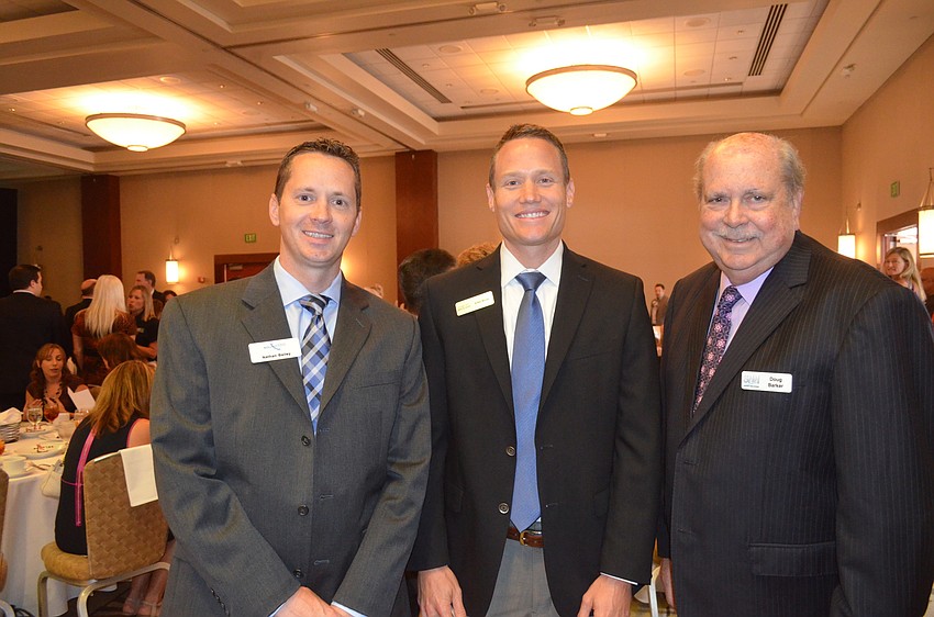Nathan Bailey, of Southtech, John Ryan, of Comcast Spotlight, and Doug Barker, of SNN