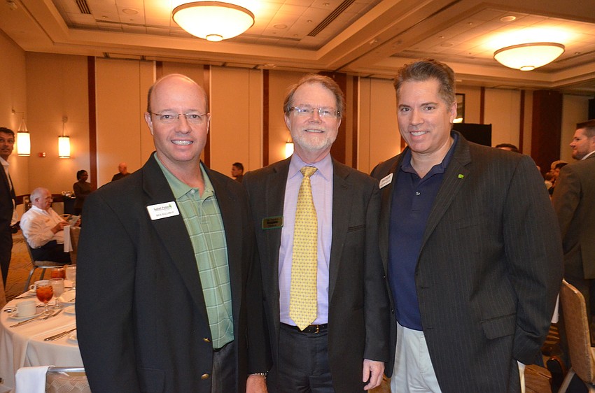 Rick Halloran, of Sabal Palm Bank, Tim Shaw, of Kirk Pinkerton, and Neil McCurry, of Sabal Palm Bank
