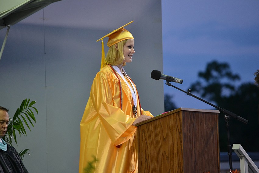 Esther Jaffee addresses students as one of two student speakers.