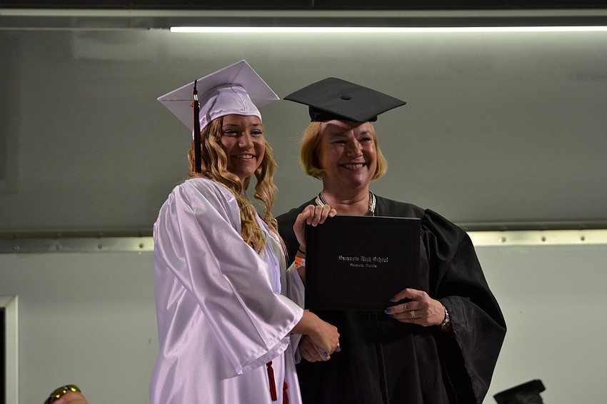 Jenna Cashmore receives her diploma.