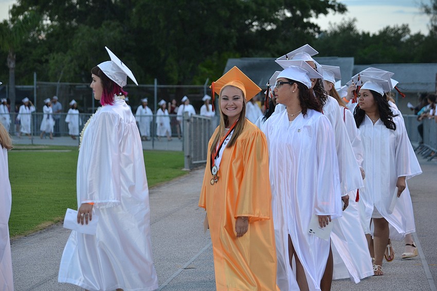 Kira Marino spots her family members.