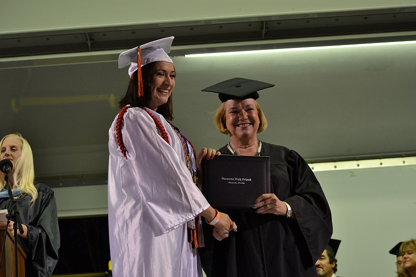 Verna Bell-Nunez receives her diploma.