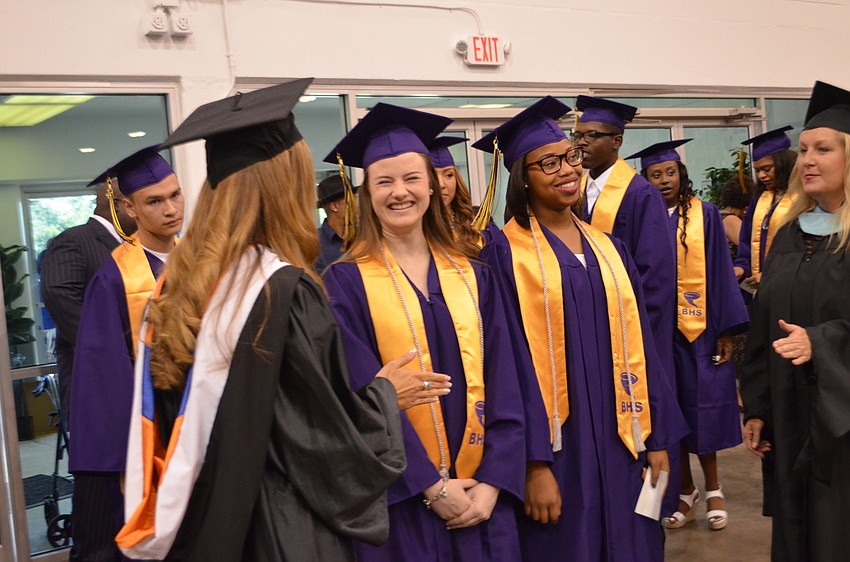 Students walk together during through the entrance to Robarts Arena.