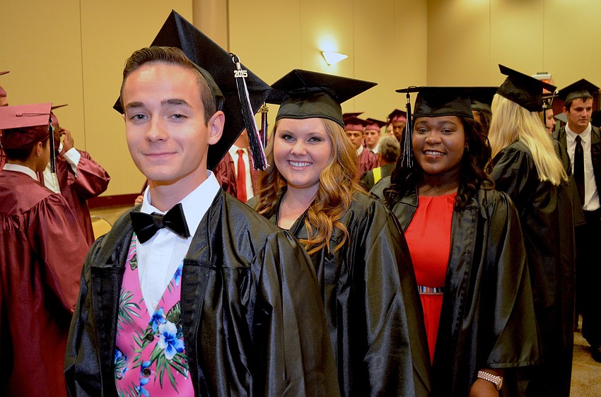Travis Belanger, Kaitlyn Beard and Chloe Bellevue line up before the ceremony.