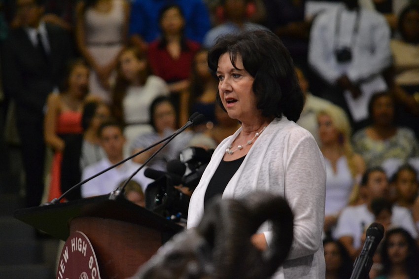 Riverview High School Principal Linda Nook addresses graduates and guests at the commencement ceremony.