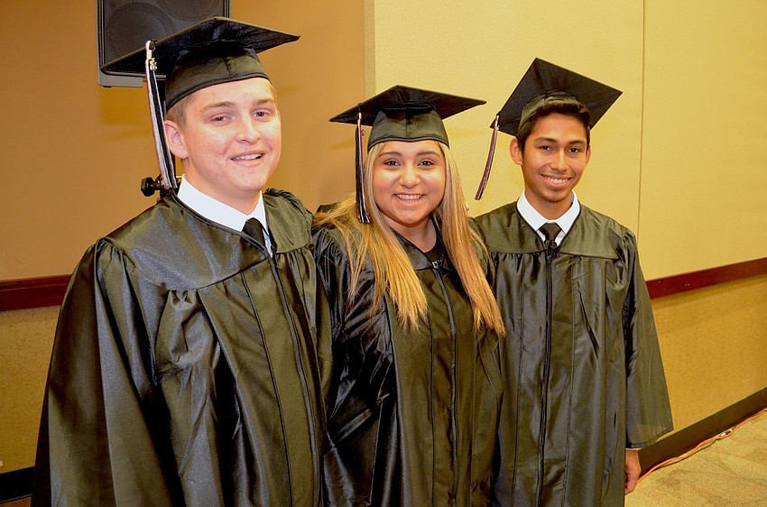 Nathan Smith poses with cousins Tiffany and Andrew Solorzano.