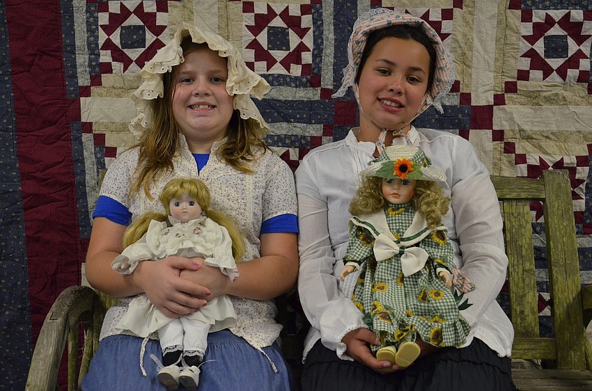 Jessica Mooney and Leyna Anderson, fifth-graders, dressed up for the frontier photo booth.