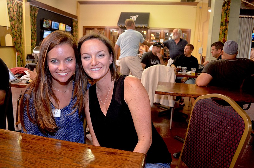 Desiree Hanright and Crystal Houghton chat after dinner and before poker.