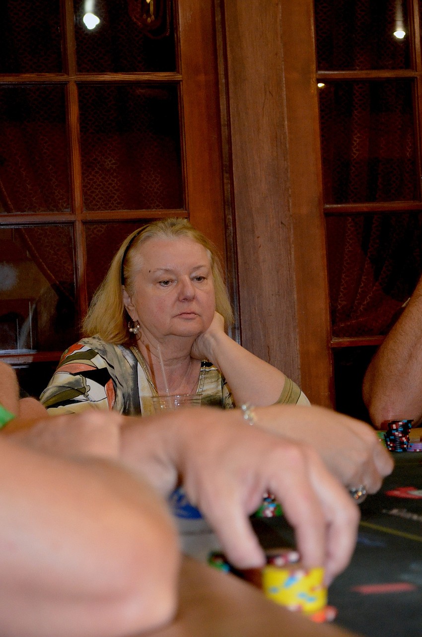 Diana Kryszak decides whether to bet or fold.