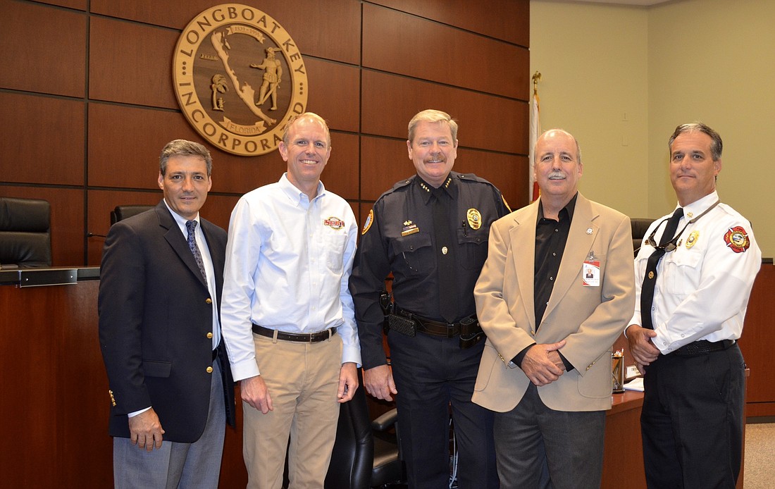 Manatee County Emergency Management Chief Don Hermey, Director of the Florida Division of Emergency Management Bryan Koon, Longboat Police Chief Pete Cumming, Sarasota County Emergency Management Chief Ed McCrane and Longboat Fire Rescue Chief Paul Dezzi
