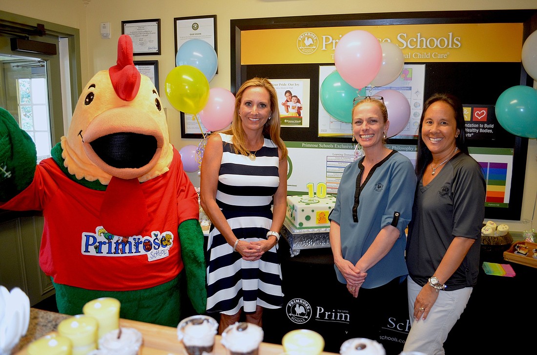 School mascot Percy celebrates 10 years of Primrose School at Lakewood Ranch Town Center, with Sharon Frank, franchise co-owner, Robin Forrester, school director, and Dianne Wudte, assistant director. Photos by Amanda Sebastiano