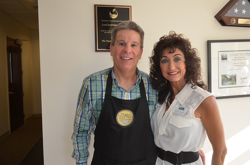 Jeff Minett, of Hosted Gourmet, and Chamber Executive Assistant Victoria Jacobson