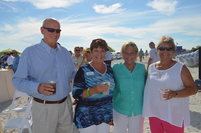 ave and Michelle Dull, of Must Do, Longboat Key Chamber President Gail Loefgren and Siesta Key Chamber Executive Director Debra Lynn