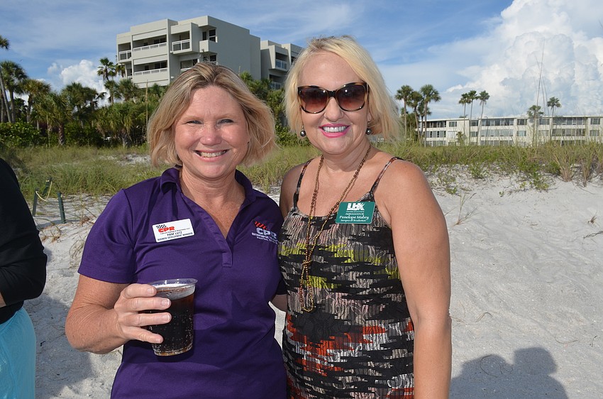 Pam Lutz, of CPR Concrete, Painting & Restoration, and Penelope Mabrey, of SERVPRO of Bradenton