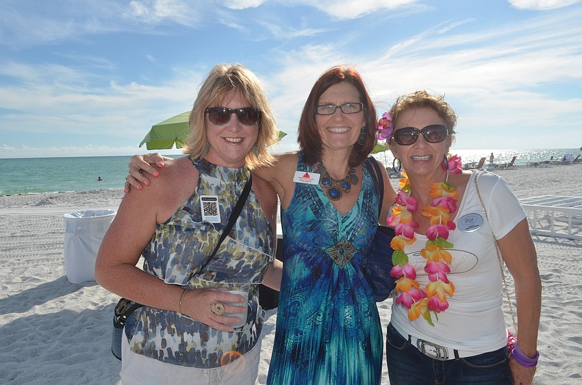 Michelle Grunberg, of iconnectu, Sherri Proctor, of Sherri’s Island Images, and Christine Olson, of Tiff’s Initiative