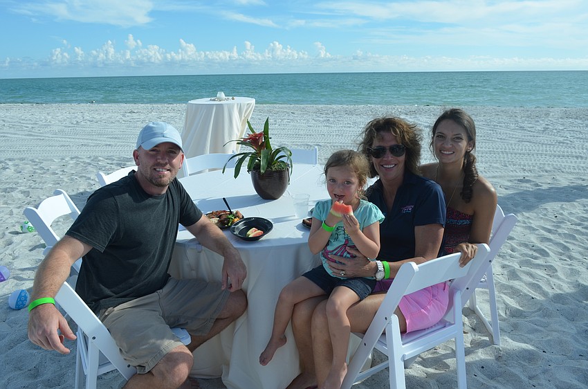 Jeremy and Jordyn Hanright, 4, with Kay and Stephanie Kouvatsos, of Village Café