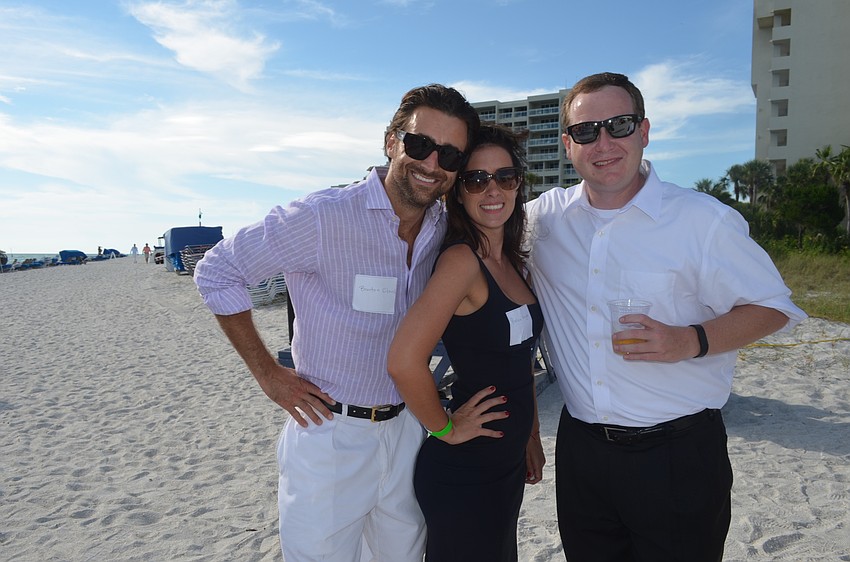 Brenton Cloud and Pallas Knight, of Cloud Pest Control, and Matt Mercier, of Bouchard Insurance