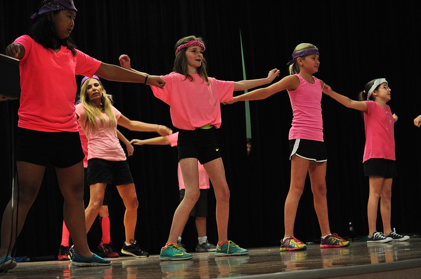 Students in Andrea Berninger’s class, 
including Emily Poulton, Lexi Kahler and Emery Muller in front, dance “The Wobble.”