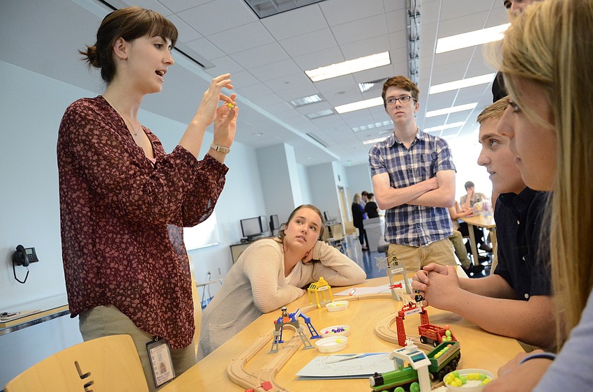 Melissa Beljan, a LECOM student, talks to students about body processes.