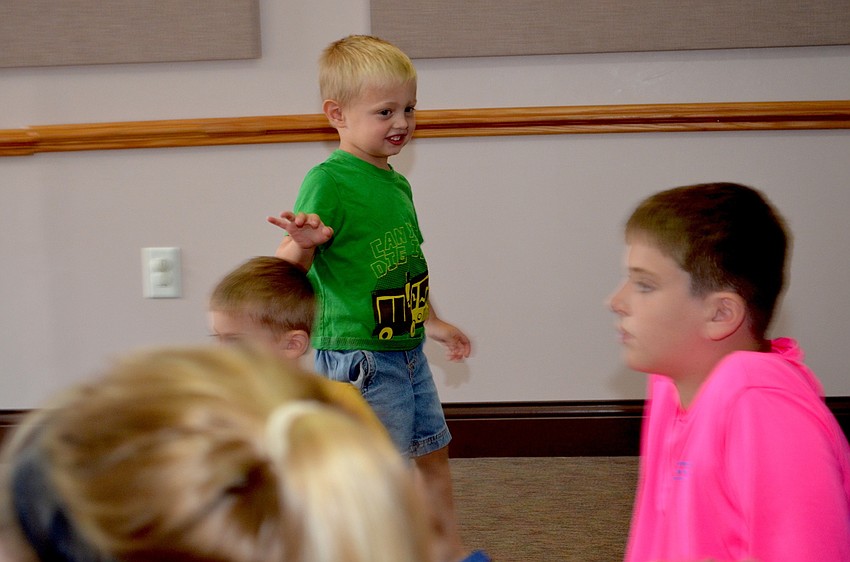 Jackson Searcy enjoys a game of Duck, Duck Goose.